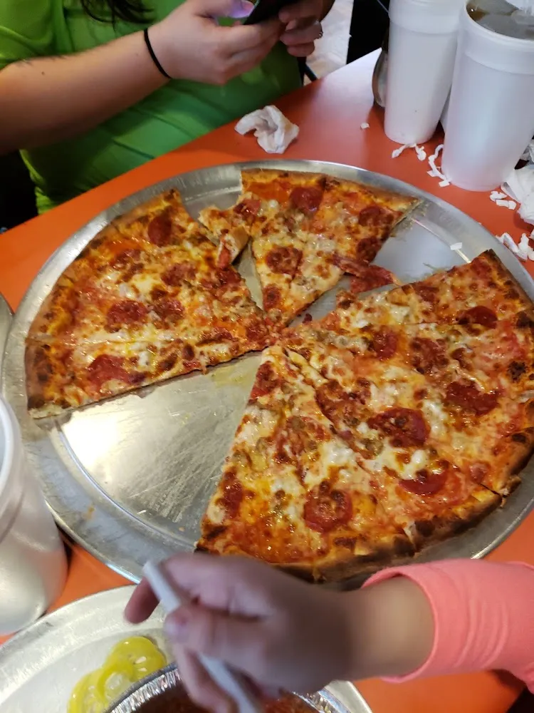 18 Pepperoni Sausage Bacon and Extra Cheese
